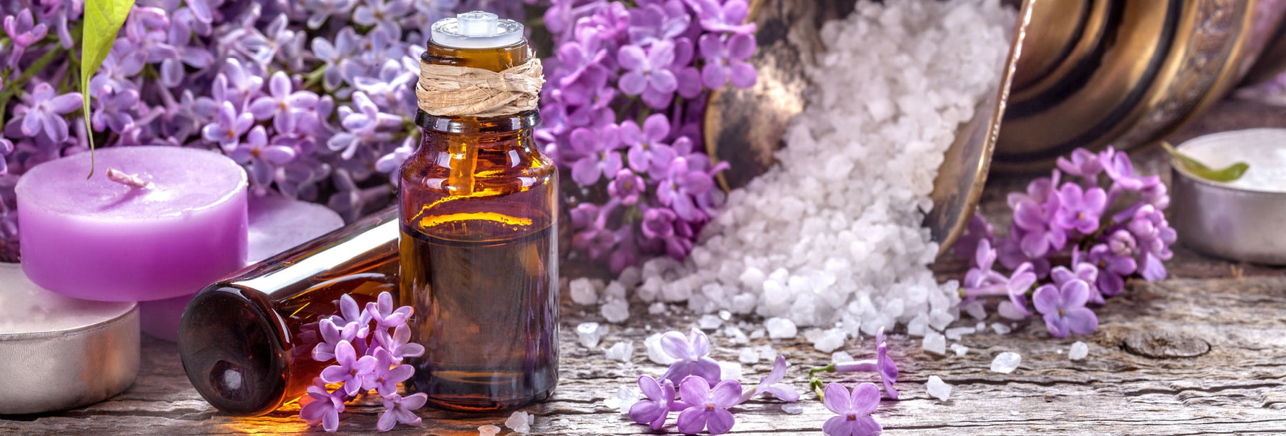 lilac candles bath salts and oil bottle