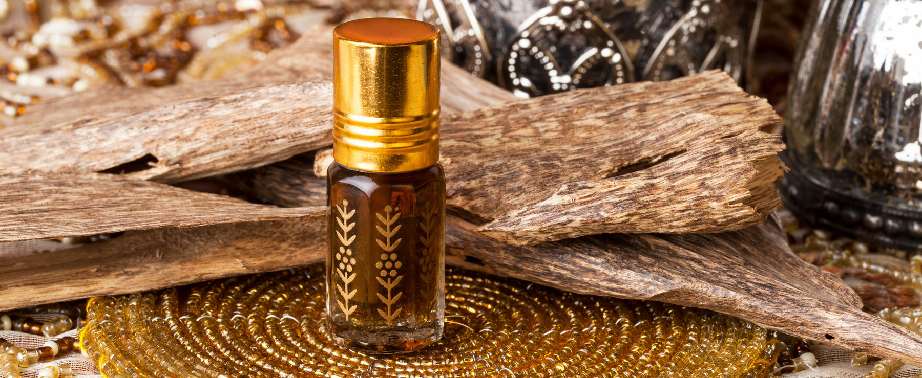 agarwood oil in bottle by wood
