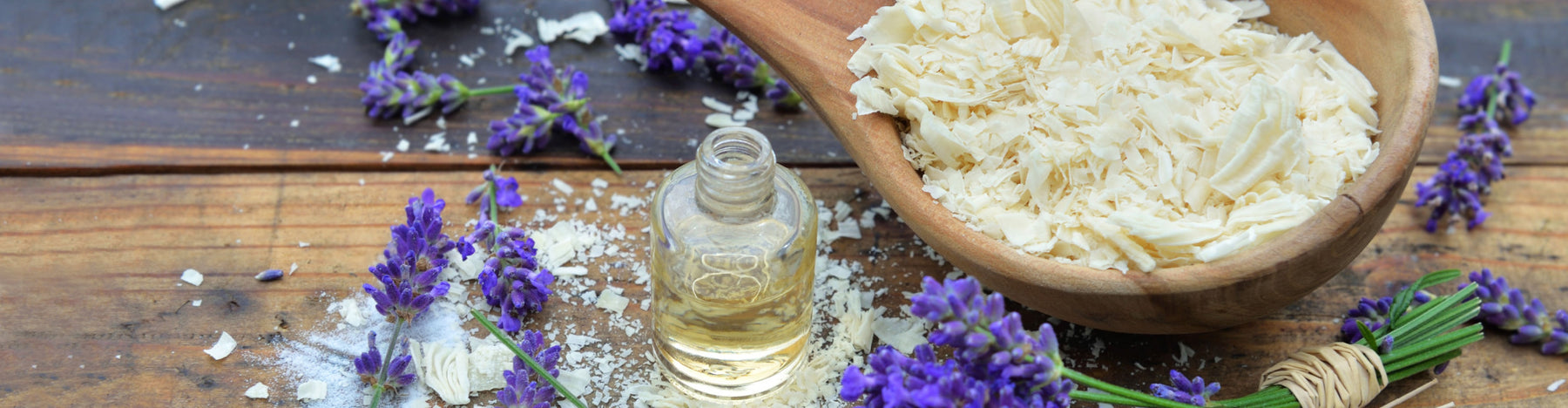 essential oil bottle with laundry soap and lavender