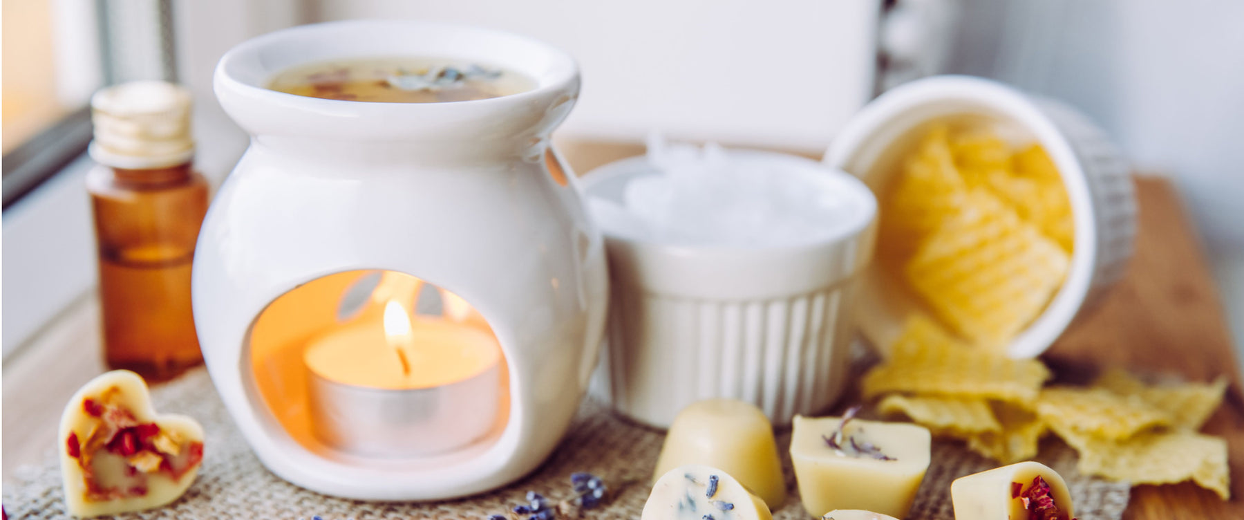 essential oil with wax warmer and melts